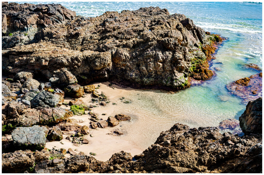 shallow rock pool in summer at byron bay nsw
